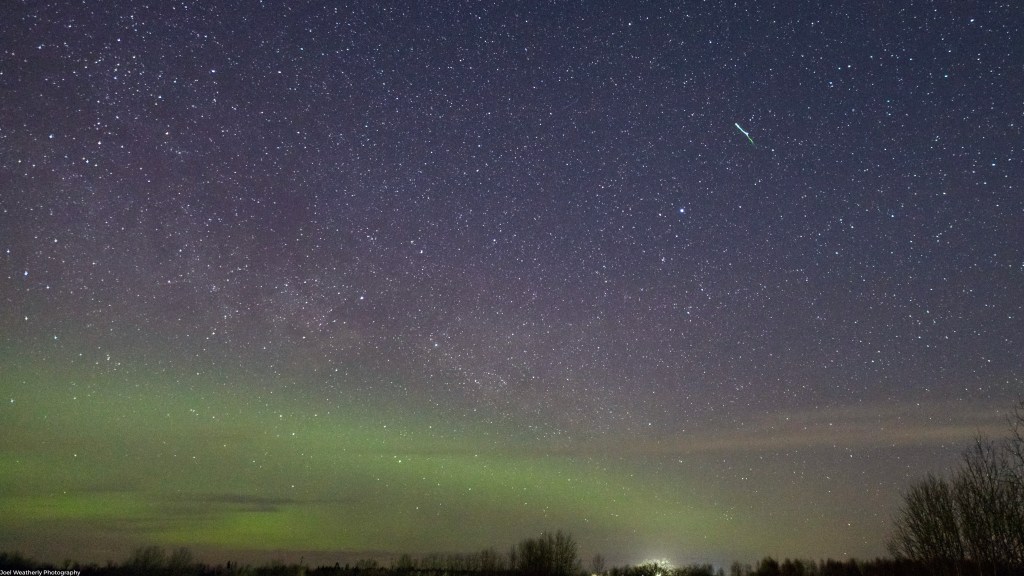 Lyrid Meteor Above Auroras